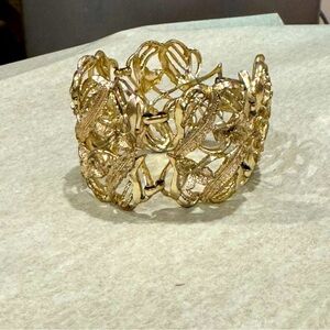 Gold tone floral brocade statement cuff bracelet